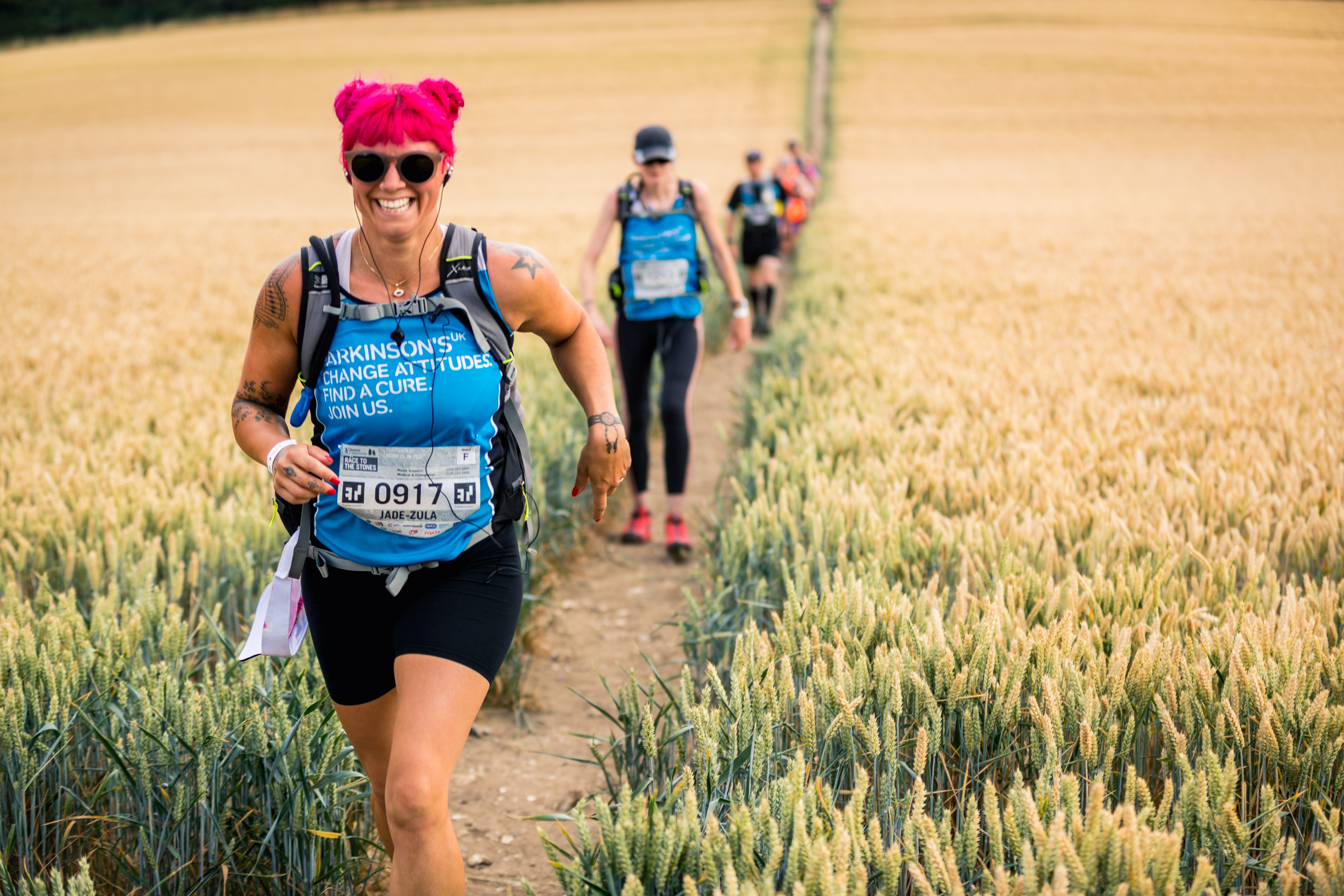 Jade walking through field during Race to Stones